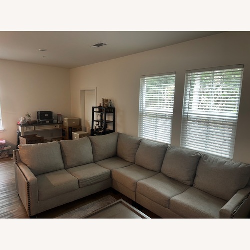 Used Raymour & Flanigan Light Gray 3+ Piece Sectional for sale on AptDeco