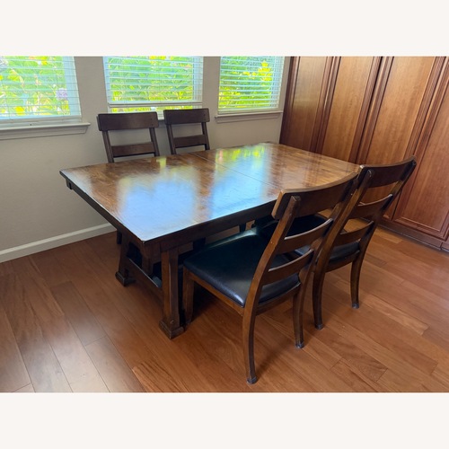 Used Mango Wood Extendable Dining Table and 6 Chairs for sale on AptDeco
