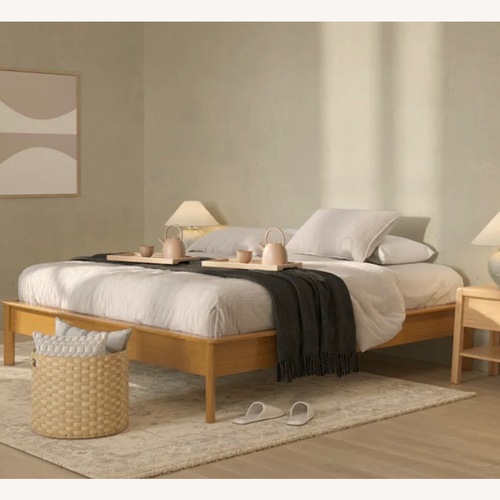 Used Article Pactera Oak King Bed and Velvet Headboard for sale on AptDeco