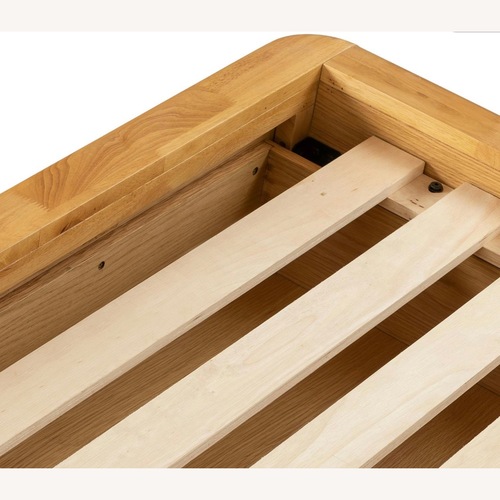 Used Article Pactera Oak King Bed and Velvet Headboard for sale on AptDeco