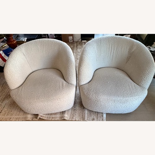 Used CB2 Gwyneth White Boucle Swivel Armchairs for sale on AptDeco