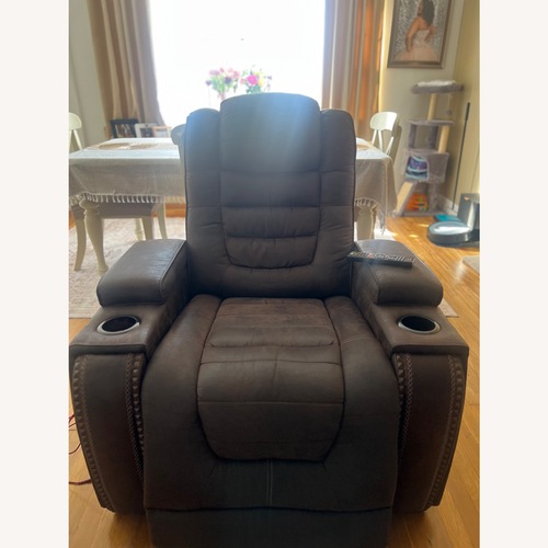 Used Ashley Furniture Dark Brown Faux Leather Recliner for sale on AptDeco
