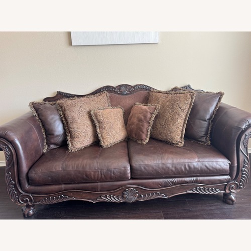 Used Leather Sofa With Pillows for sale on AptDeco