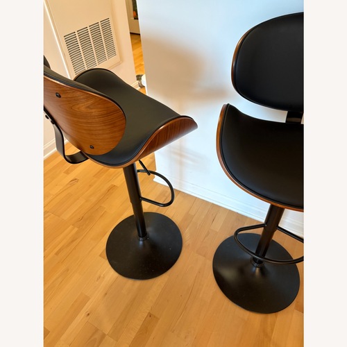 Used Black Leather Stool for sale on AptDeco