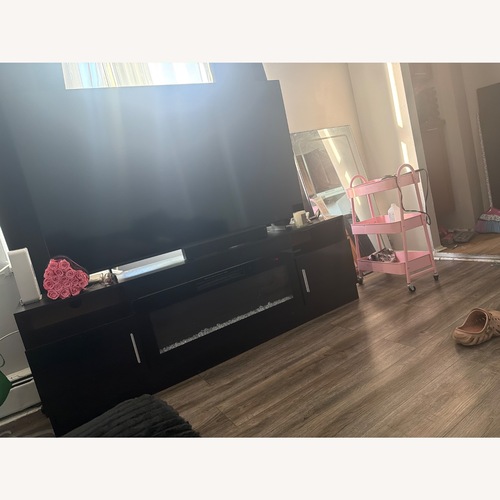 Used VITESSE 70”Fireplace TV Stand for sale on AptDeco