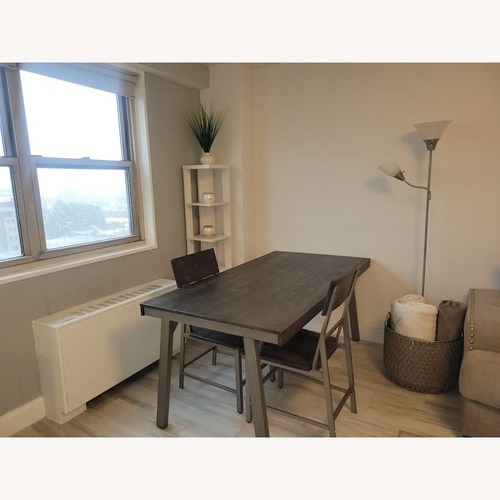 Used Modern Dining / Work Table for sale on AptDeco