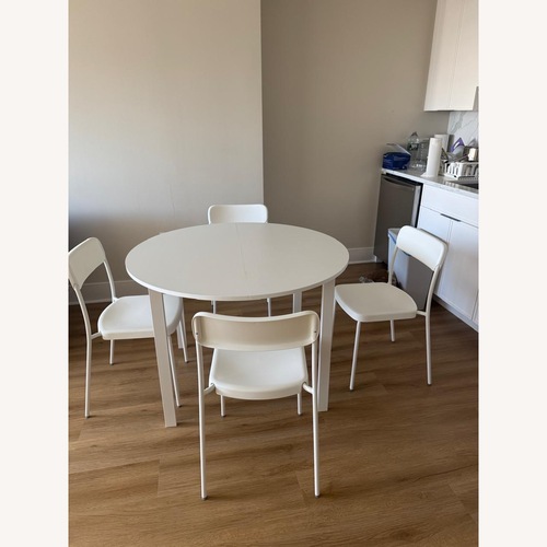 Used IKEA VIHALS Round Table 4 Chairs for sale on AptDeco
