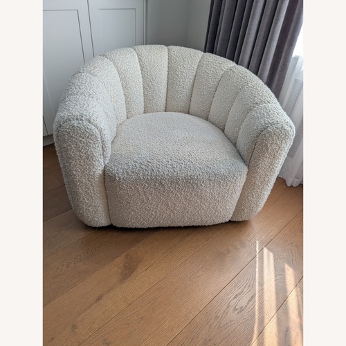 Used CB2 Fitz Channeled White Boucle Swivel Chair for sale on AptDeco