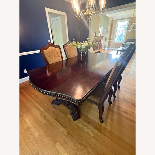 Used Universal Furniture Dark Brown Wood Dining Set for sale on AptDeco