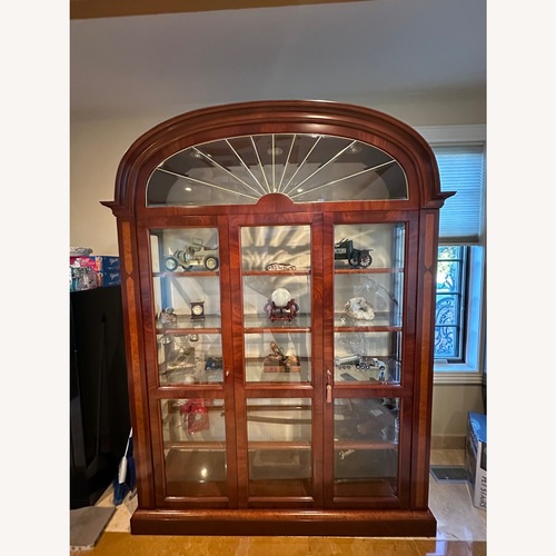 Used Wooden Curio Cabinet for sale on AptDeco