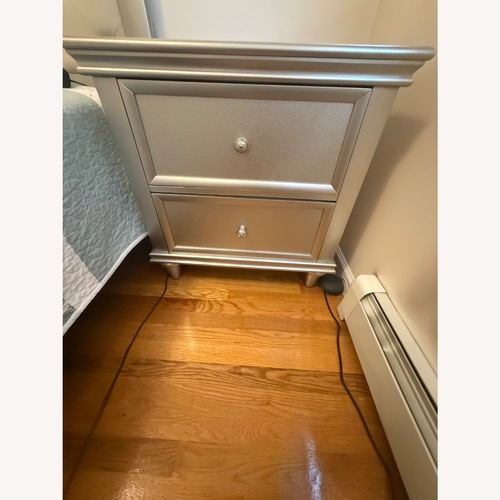 Used Bob's Discount Furniture Silver Nightstand for sale on AptDeco