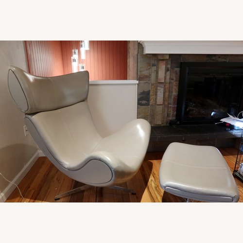 Used BoConcept Imola Leather Swivel Chair + Footstool for sale on AptDeco