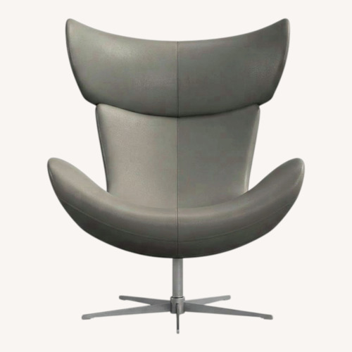 Used BoConcept Imola Leather Swivel Chair + Footstool for sale on AptDeco