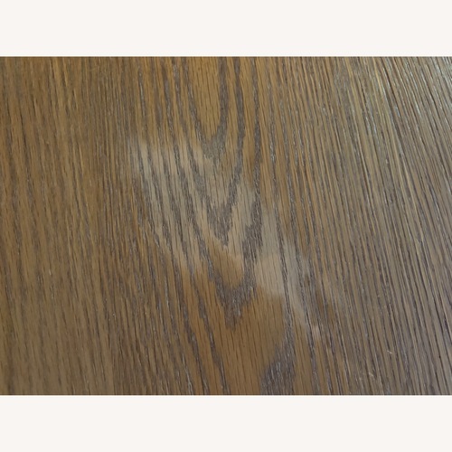 Used Arhaus Dining Table in Weathered Oak for sale on AptDeco