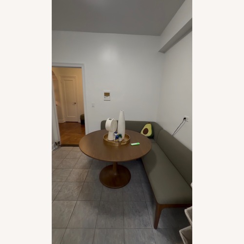 Used Article Hendrick Dark Brown Wood Dining Table for sale on AptDeco