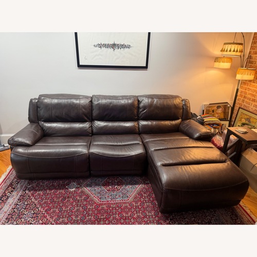 Used Dark Brown Leather 2 Piece Sectional for sale on AptDeco