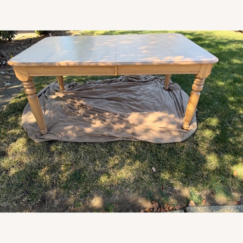 Used Canadel Natural Wood Dining Table for sale on AptDeco