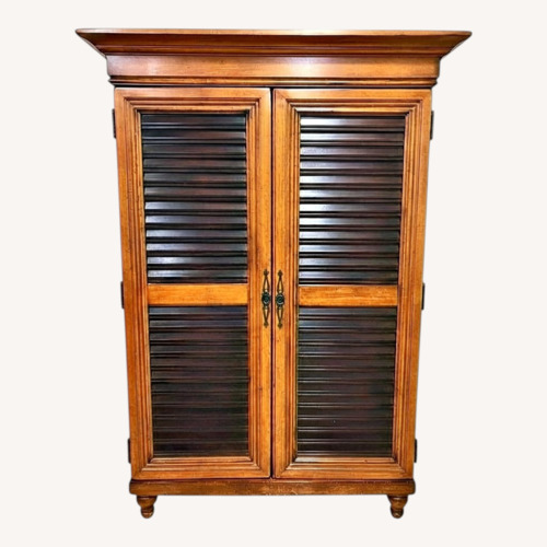 Used Tommy Bahama Light Brown Wood Armoire for sale on AptDeco