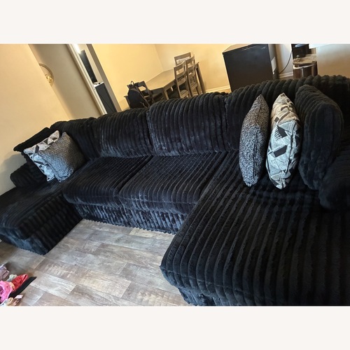 Used Ashley Furniture Black 3+ Piece Sectional for sale on AptDeco