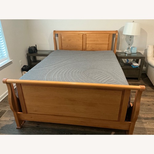 Used Brown Queen Size Sleigh Bed Frame + Queen Size Bed for sale on AptDeco