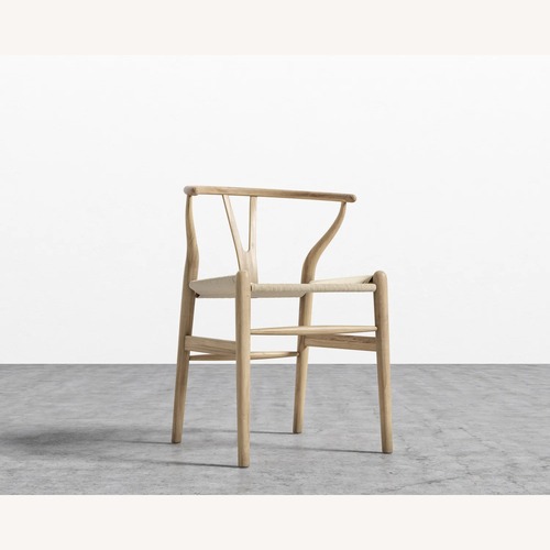 Used Rove Concepts Natural Wood Dining Chairs for sale on AptDeco
