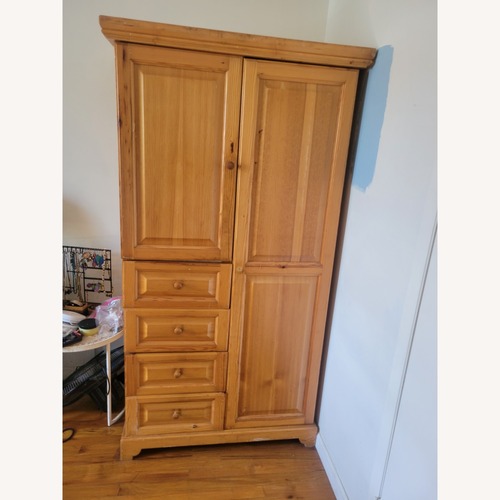 Used Gothic Cabinet Craft Natural Wood Armoire for sale on AptDeco