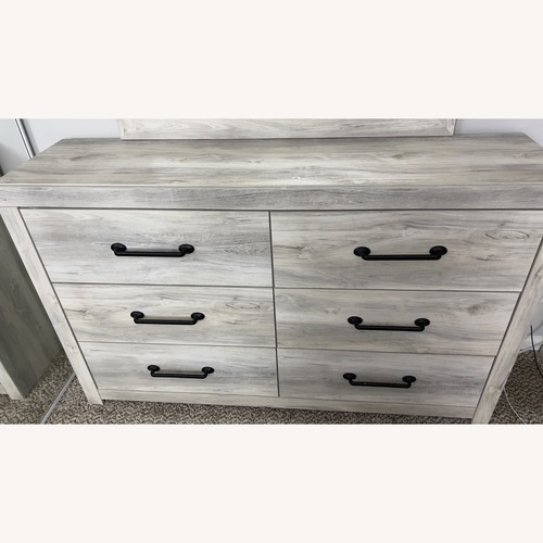Used Ashley Furniture Light Gray Wood Dresser for sale on AptDeco