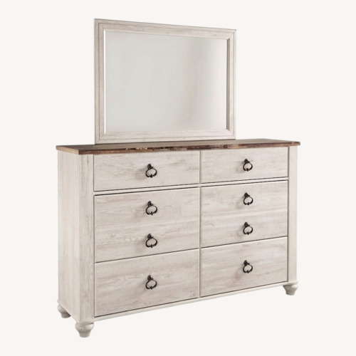Used Ashley Furniture Wood Dresser and Mirror for sale on AptDeco