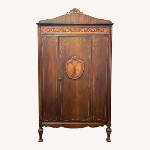Used Vintage/Antique Dark Brown Wood Armoire for sale on AptDeco