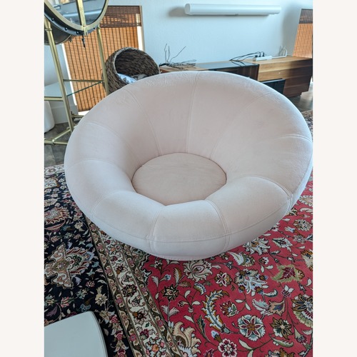 Used Pottery Barn Teen Rose Swivel Lounge Chair for sale on AptDeco
