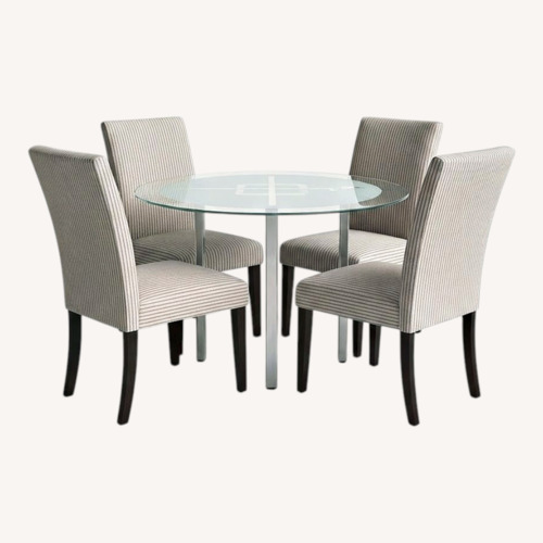Used Transparent Glass Dining Table and 4 Chairs for sale on AptDeco