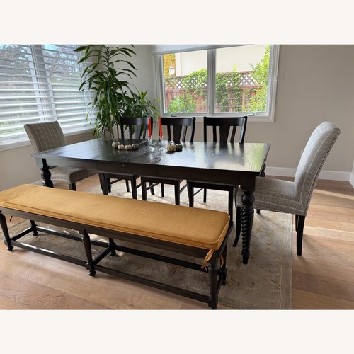 Used Bassett Dark Brown Wood Dining Table (8 seater) for sale on AptDeco