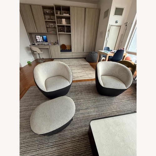Used Roche Bobois Swivel Chairs With Matching Ottoman for sale on AptDeco