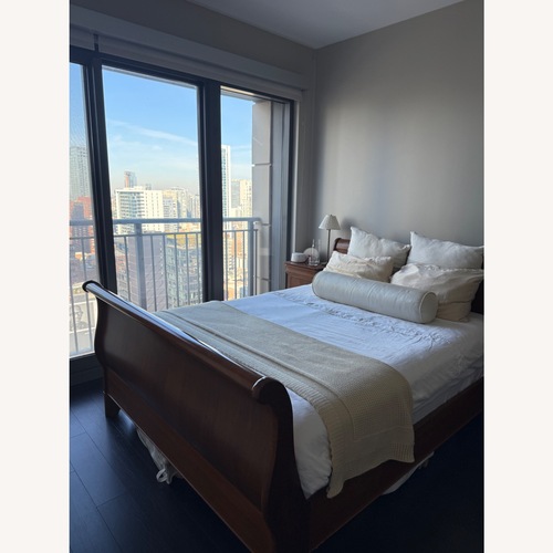 Used Vintage Ethan Allen Queen Bed Frame for sale on AptDeco