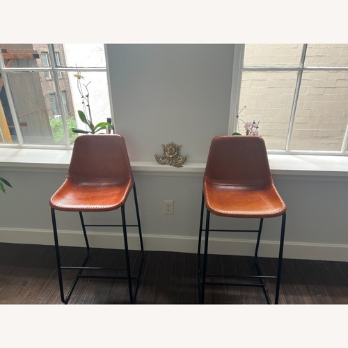 Used CB2 Roadhouse Saddle Leather Bar Stool for sale on AptDeco