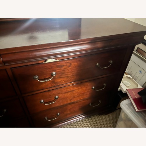 Used Vintage/Antique Dark Brown Wood Dresser for sale on AptDeco