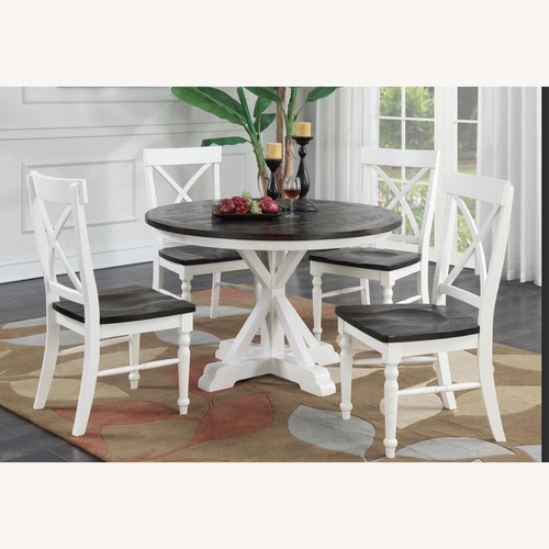 Used Round Dining Table with 4 Chairs in Hard Wood for sale on AptDeco