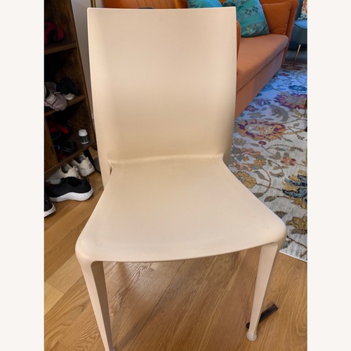Used Bellini Furniture White Plastic Dining Chairs for sale on AptDeco