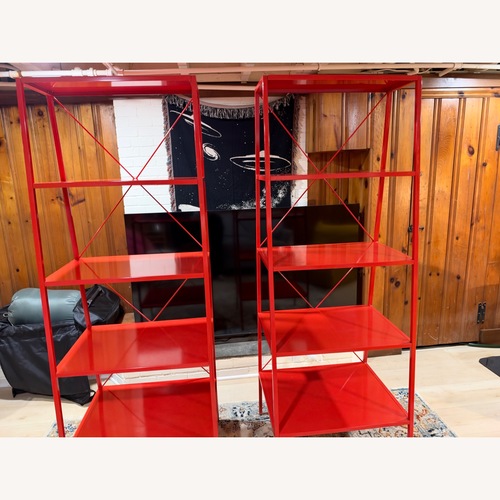Used Pair of CB2 Red Metal Bookcases for sale on AptDeco