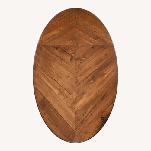 Used Oval Dining Table w Knotty Wood Top & Banded Edge for sale on AptDeco