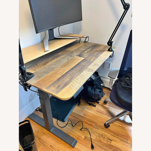 Used Vari Electric Standing Desk with ComfortEdge™ 48x30 for sale on AptDeco