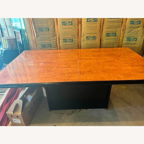 Used Light Brown Wood Dining Table for sale on AptDeco