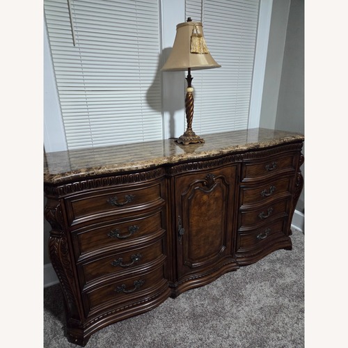 Used Dark Brown Marble Dresser for sale on AptDeco