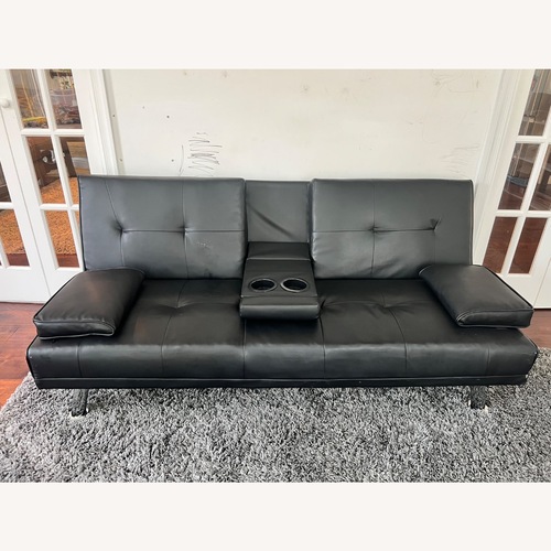 Used Loveseat With Cup Holders, Folds Flat for Sleeping for sale on AptDeco