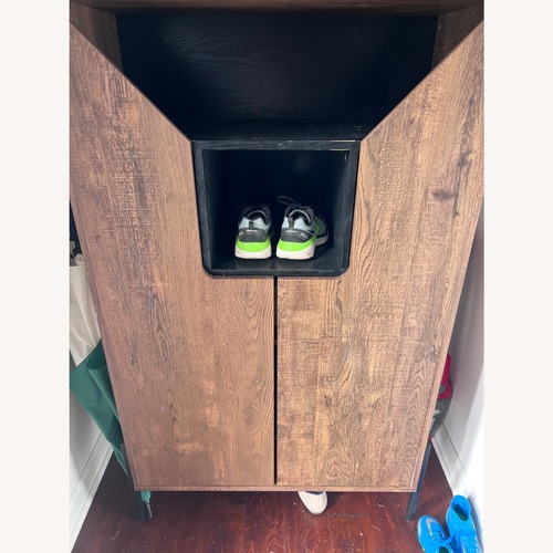 Used Dark Brown Wood Armoire for sale on AptDeco