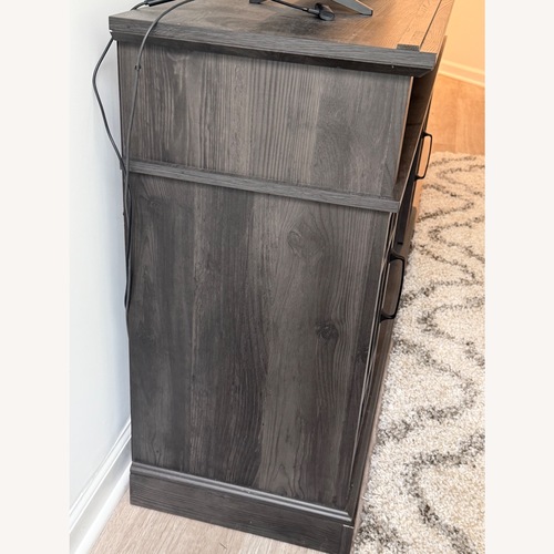 Used 58" TV Stand with 23" Electric Fireplace for sale on AptDeco