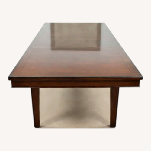 Used Dark Brown Dining Table for sale on AptDeco