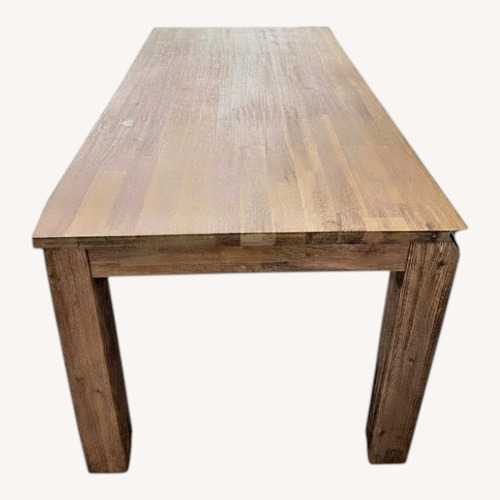 Used Light Brown Solid Accacia Wood Dining Table for sale on AptDeco