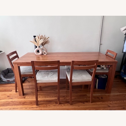 Used De Le Espada Solid Wood Dining Table + Chairs  for sale on AptDeco