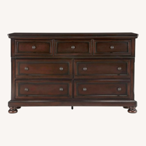 Used Raymour & Flanigan Wood Dresser and Mirror for sale on AptDeco